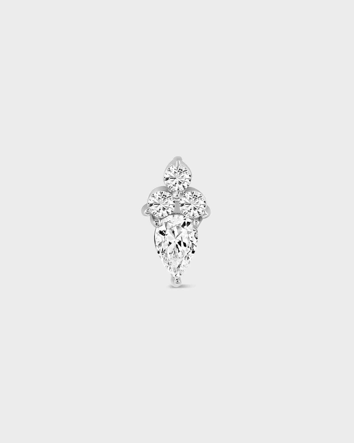 Diamond earring on a light gray background