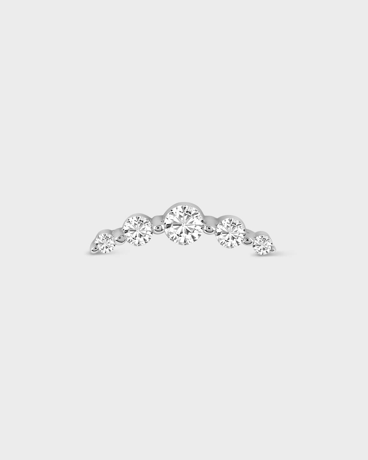 Diamond earring on a light gray background