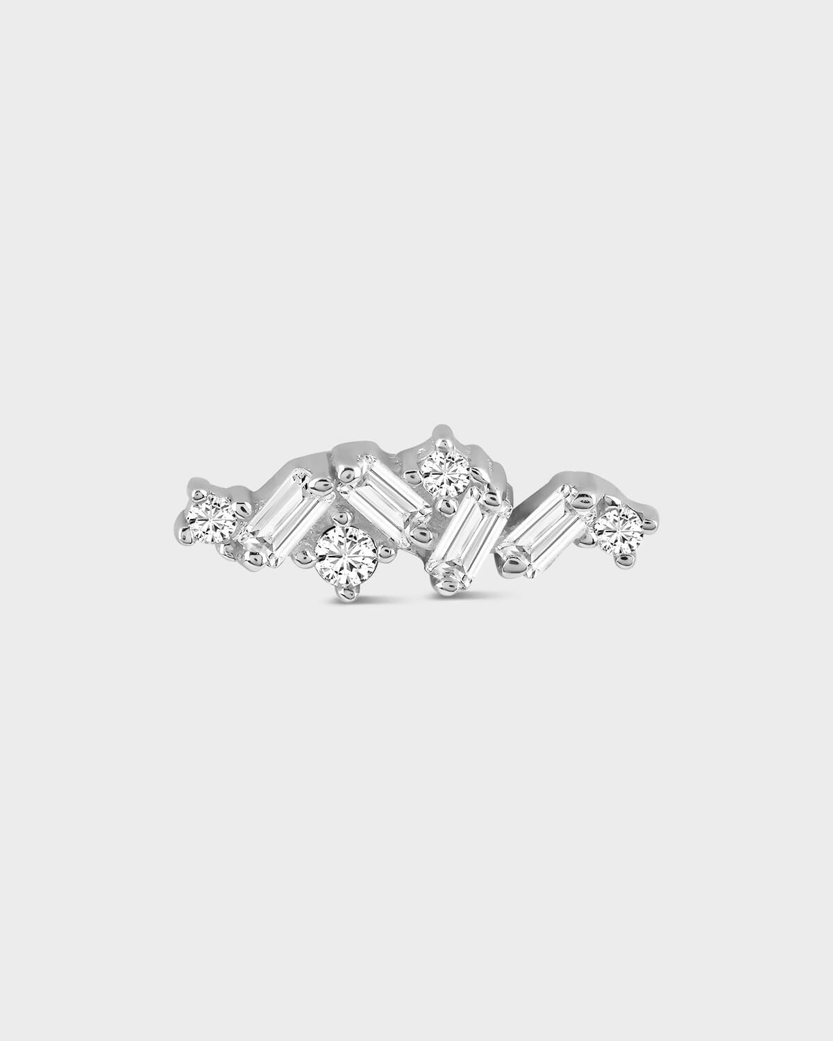 Diamond earring on a light gray background