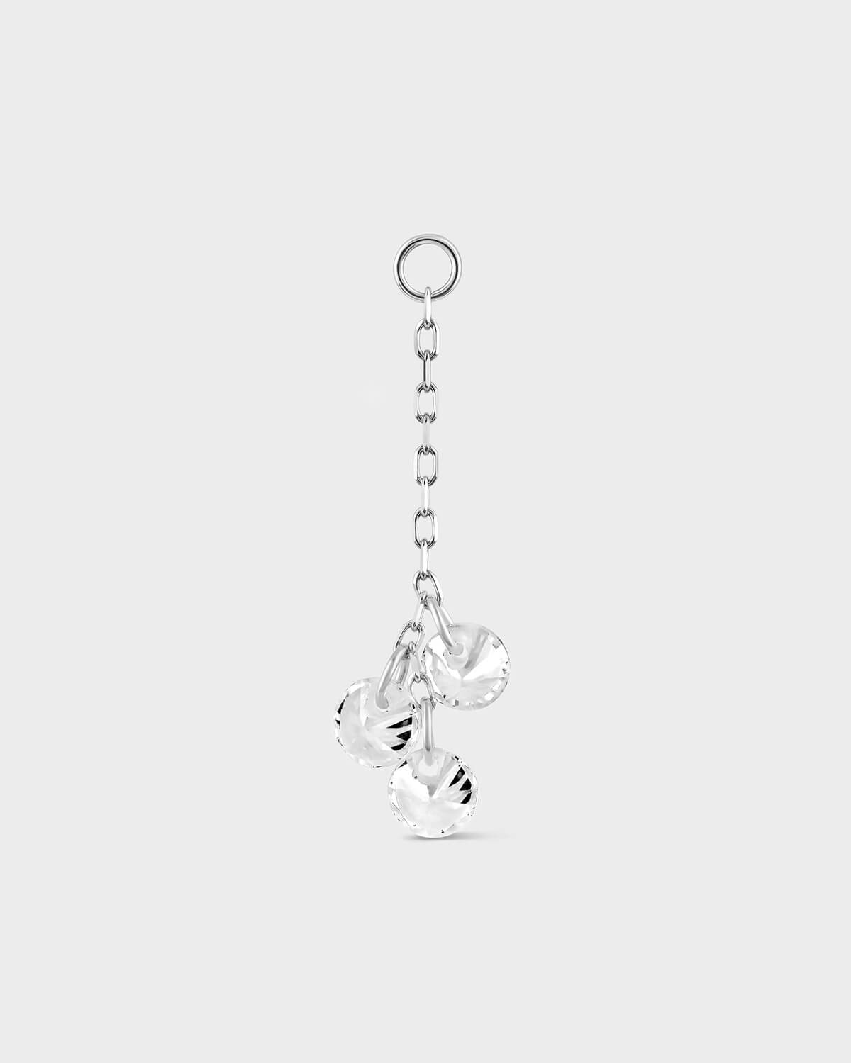 White gold earring chain with three clear crystal pendants on a white background