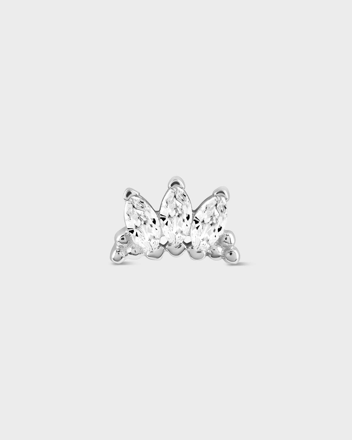 Butterfly-shaped diamond earring on a light gray background