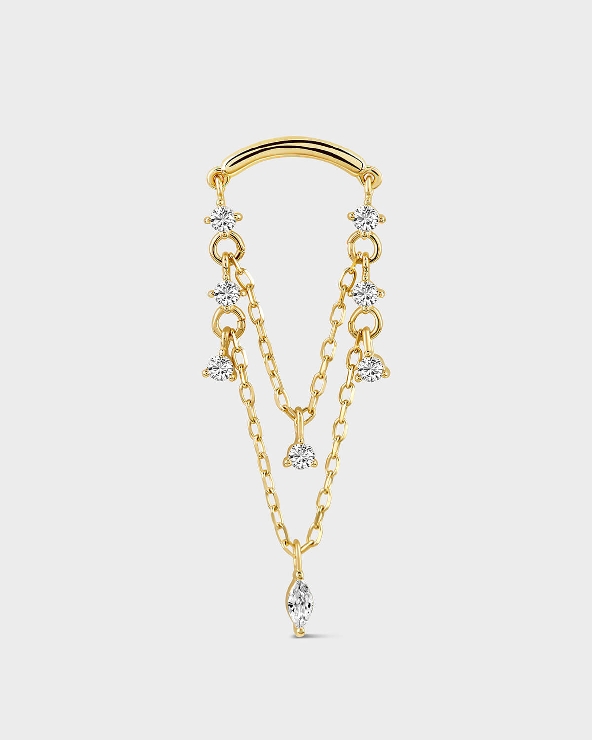Gold hidden helix jewellery with double chain and diamond-like stones on a light gray background