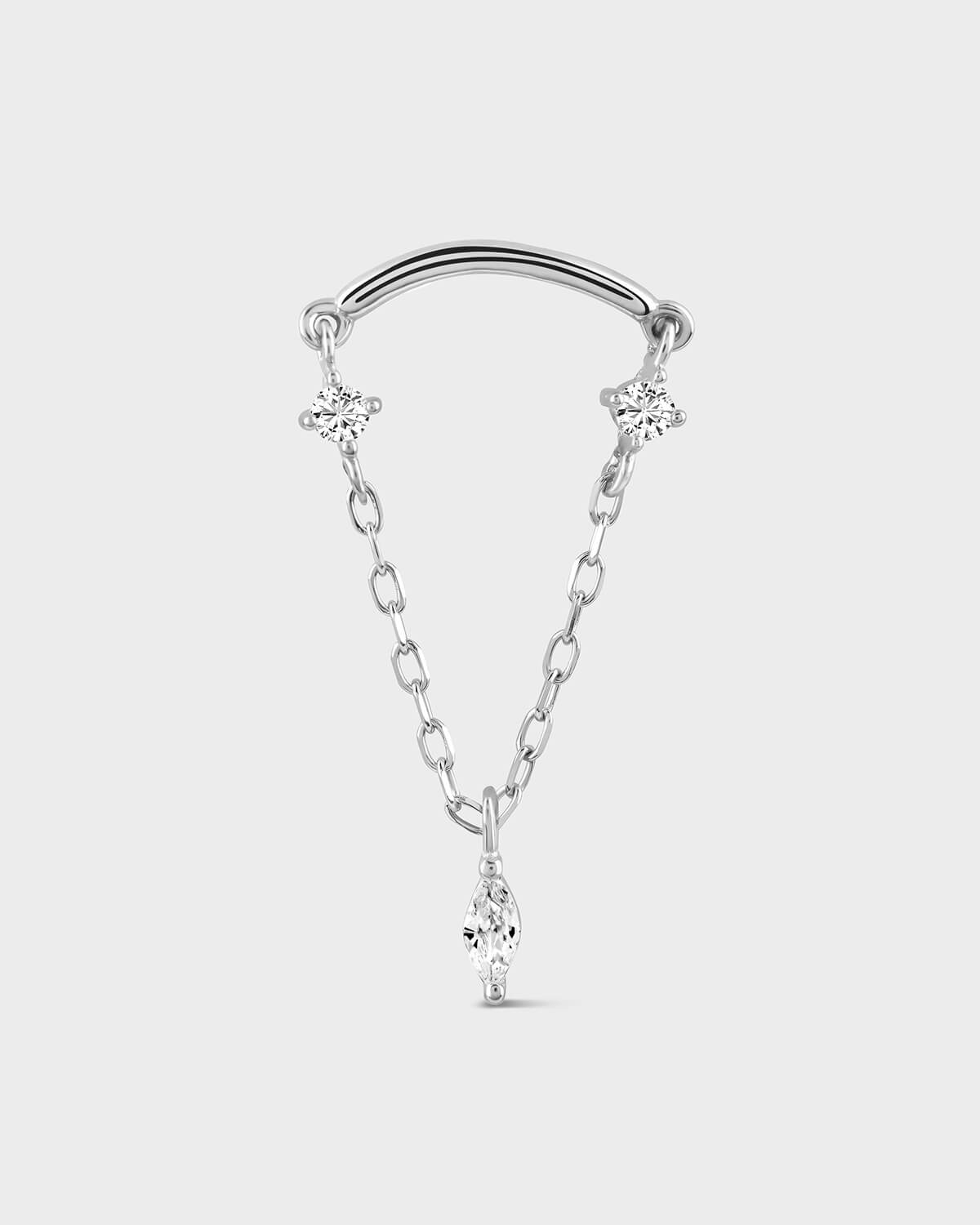 White gold hidden helix jewellery with 2 round getms and a marquise drop on a light gray bacground