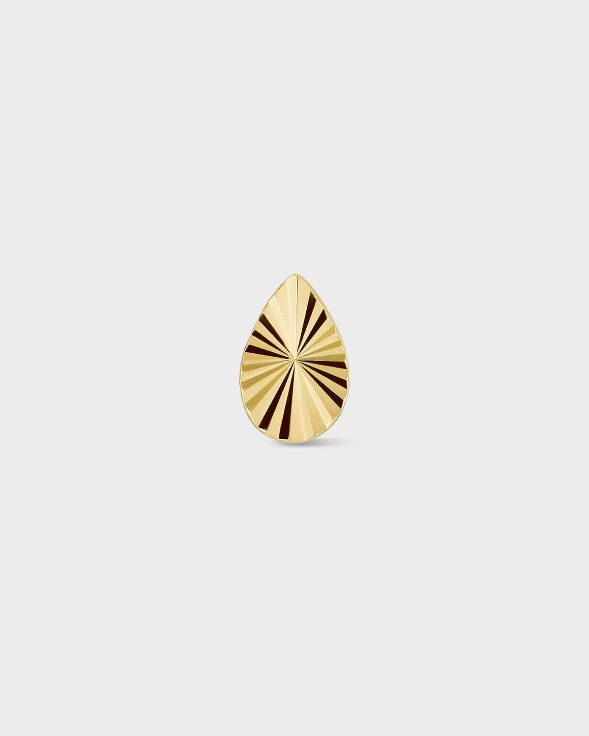 Gold teardrop-shaped earring on a light gray background