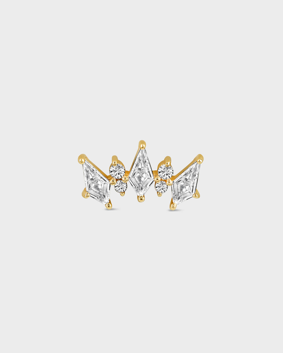 Gold and diamond earring on a white background